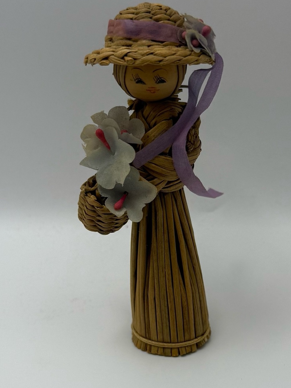 Source Unknown Straw Doll Figurine with Purple Ribbon and White Flowers